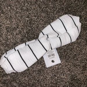 White with black striped headband